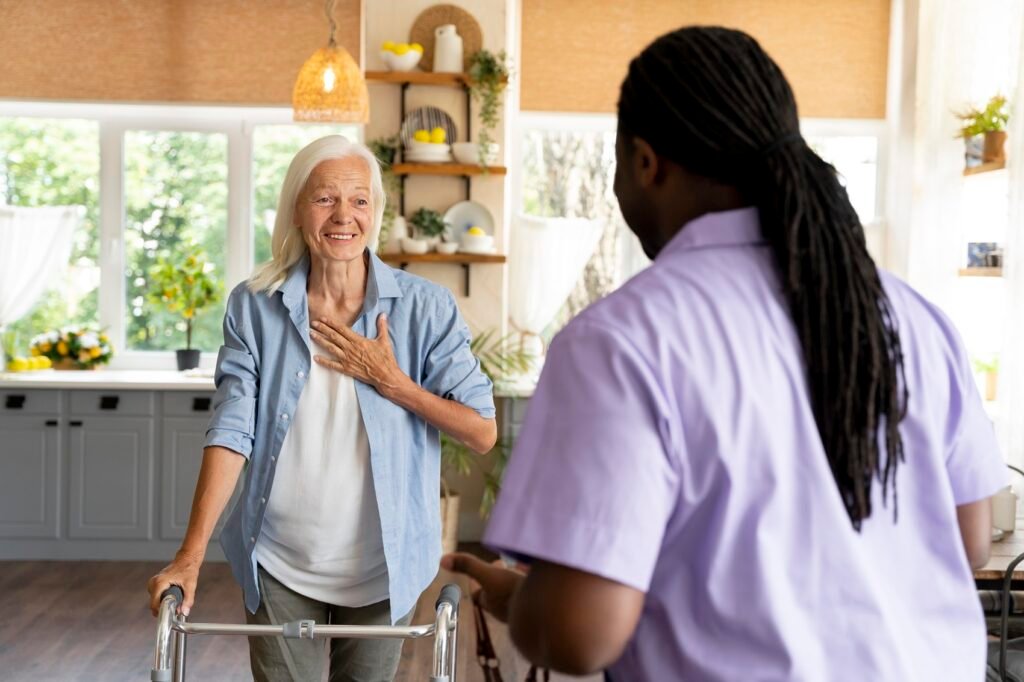 african social worker taking care senior woman