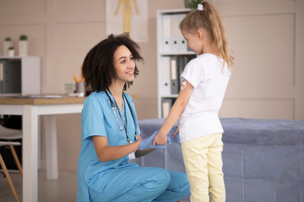 doctor taking care patient after vaccination