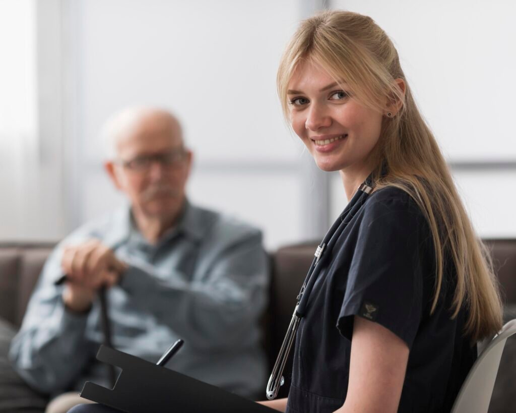 smiley female nurse posing with man nursing home